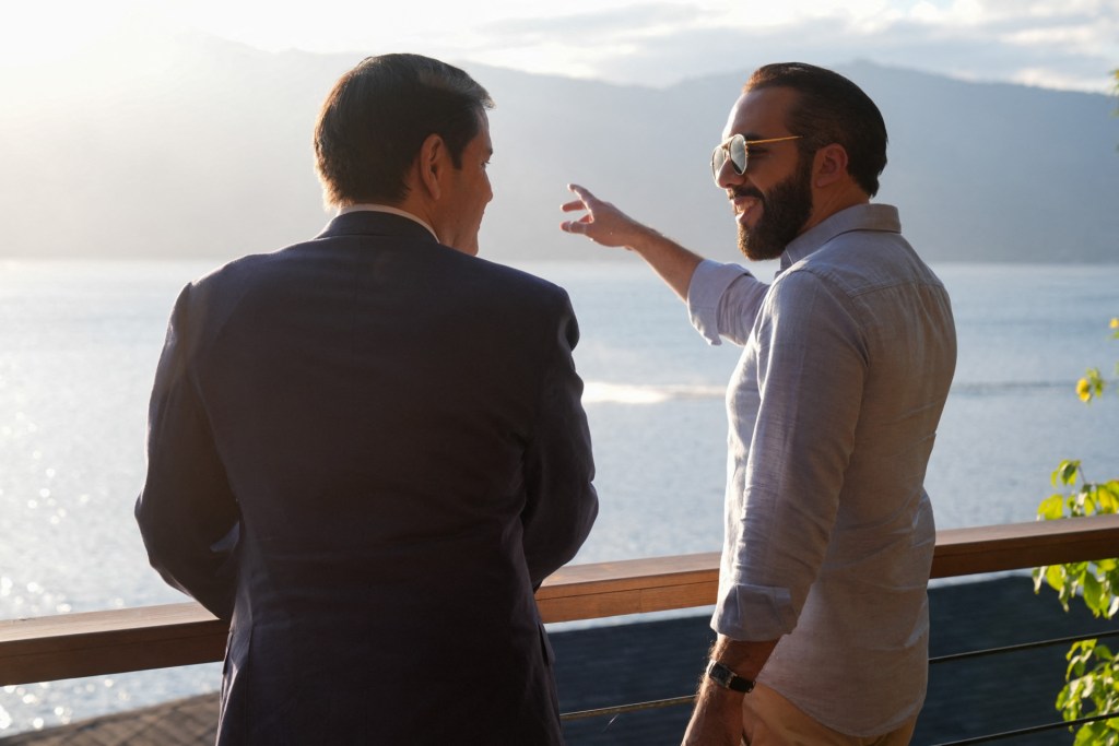 U.S. Secretary of State Marco Rubio (L) meets with El Salvador's President Nayib Bukele at his residence at Lake Coatepeque in El Congo municipality, El Salvador, on February 3, 2025. (Photo by MARK SCHIEFELBEIN/POOL/AFP via Getty Images)
